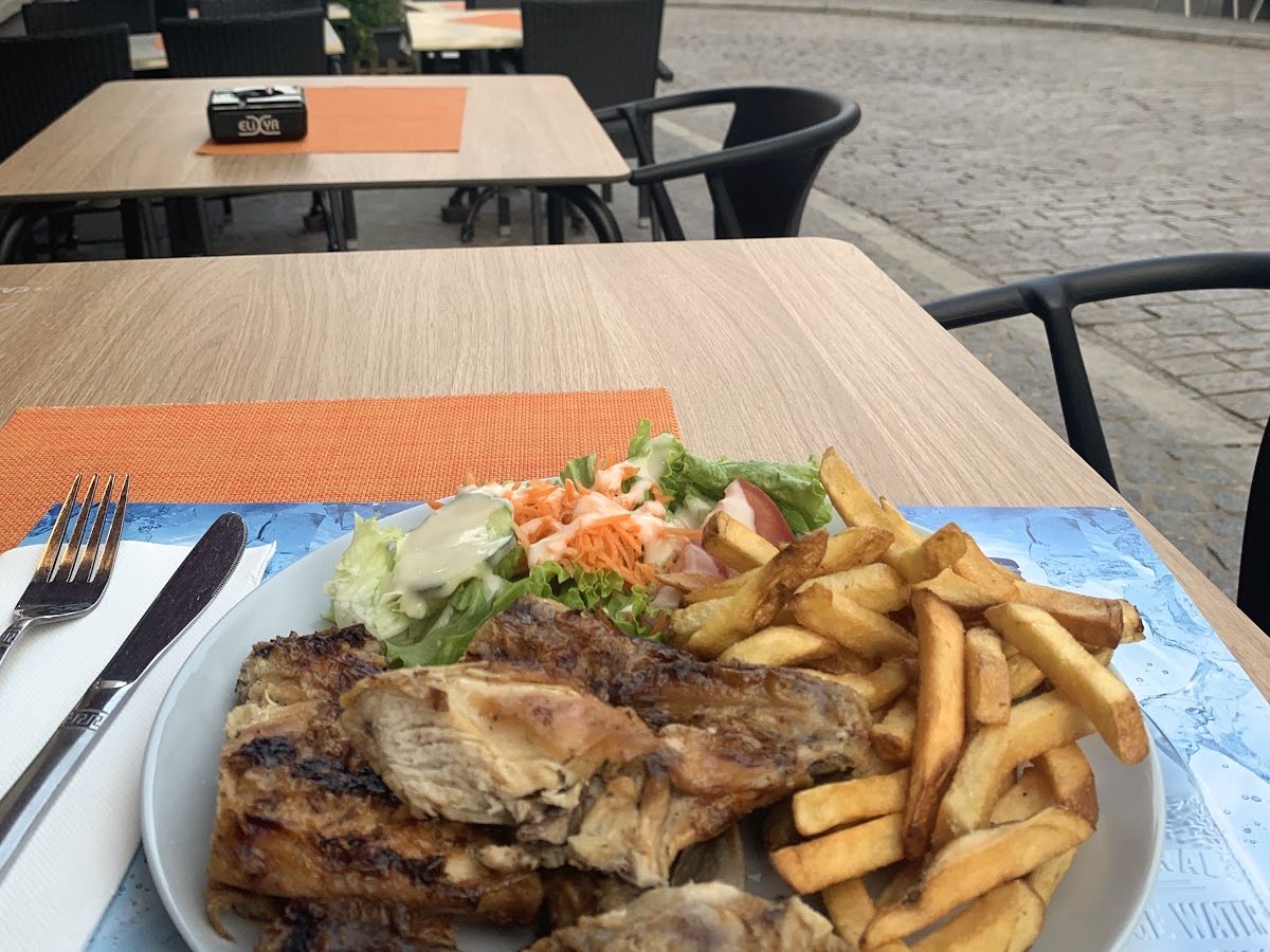 Generous plate of food served on the terrace at La Poste
