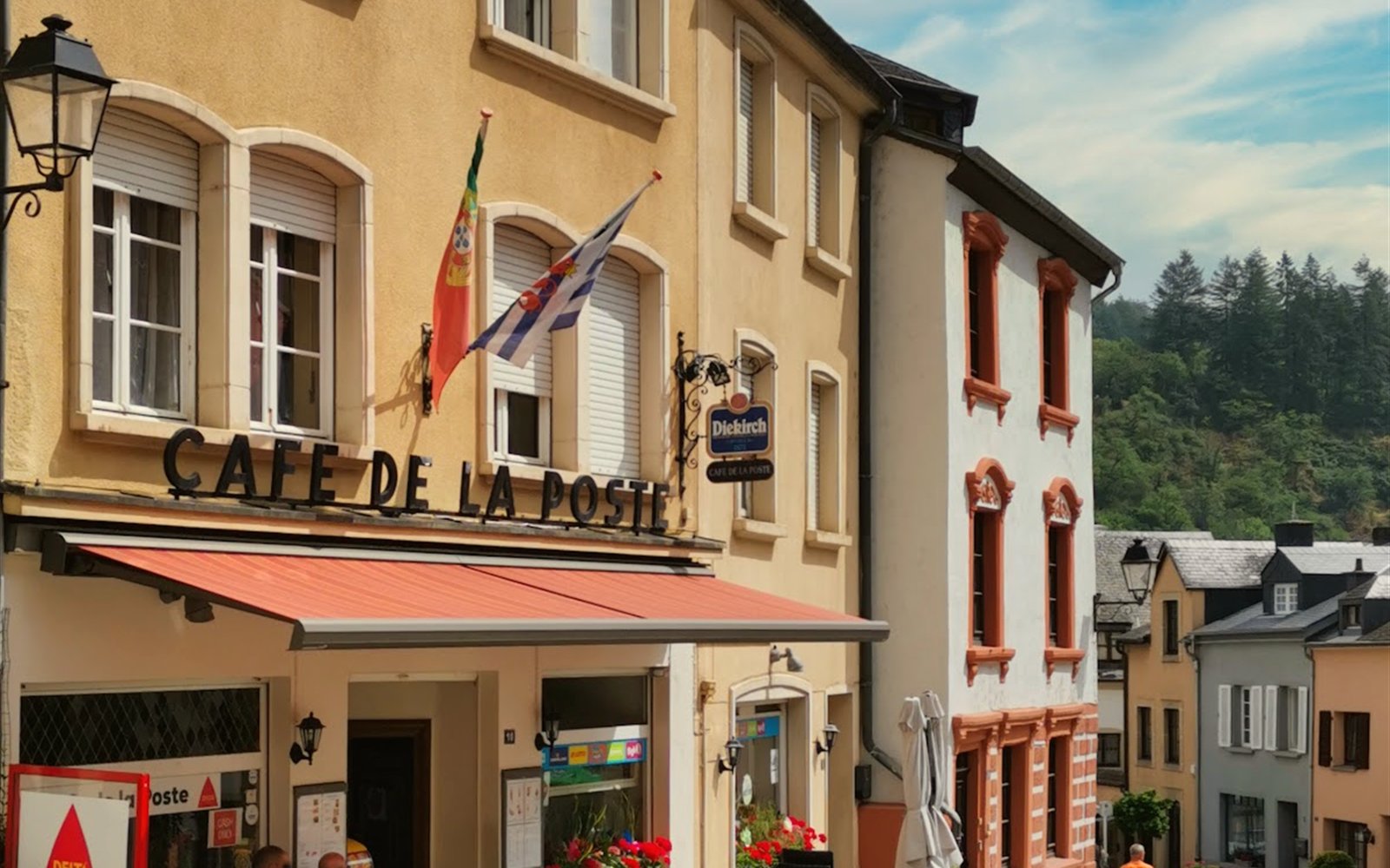 La Poste caf&eacute; storefront and terrace on Grand-Rue in Vianden