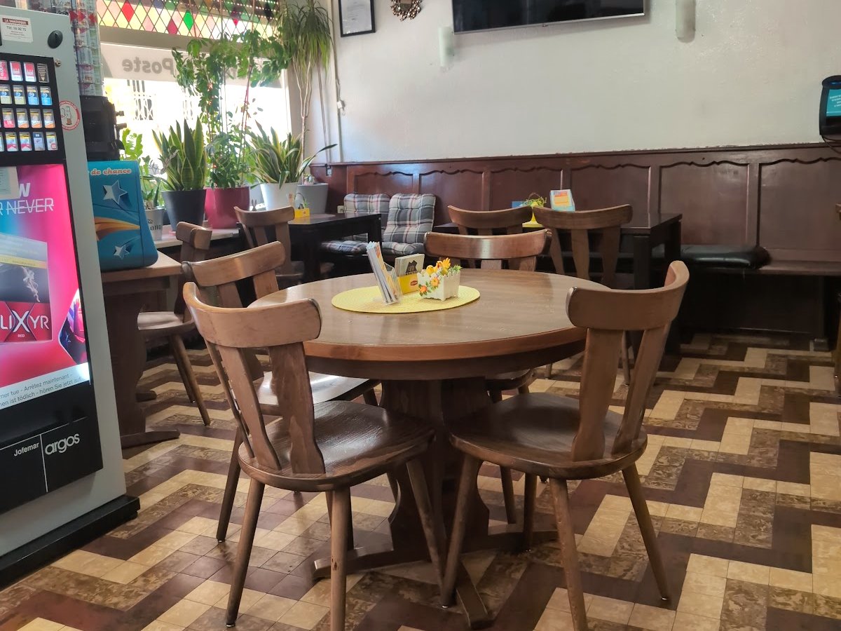 Warm local caf&eacute; interior at La Poste